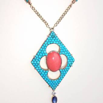 14Kt gold and silver back set with precious red coral,sapphire. Diamond and light color turquoise.