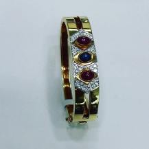 18Kt white and yellow gold bracelet set with sapphire rubies and diamonds,Circa 1950