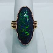 14Kt pink and yellow gold ring set with black opal,circa 1940
