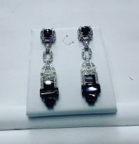 Platinum earrings set with diamonds and black enyx.art deco